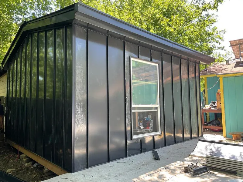 Black standing seam metal wall panels for Roof Inspection in Hopkinton